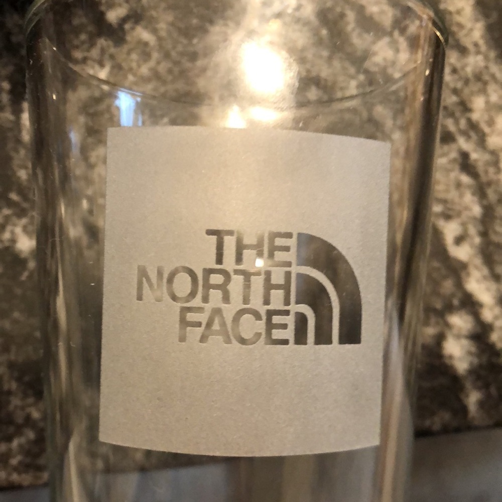 The North Face pint glass